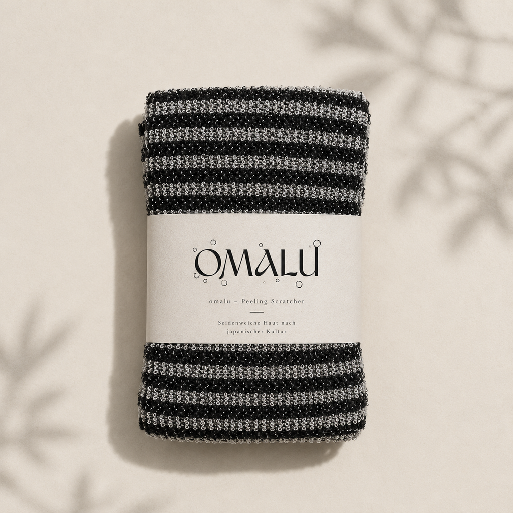 Omalu Peeling Scratcher zusammengerollt mit Banderole, Aufsicht
